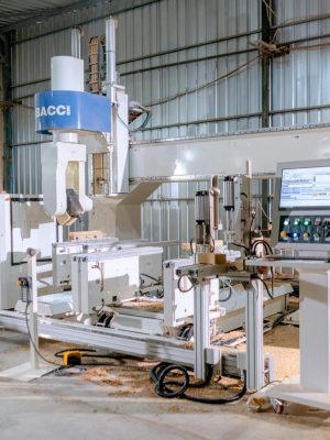 High-tech woodworking machine in an industrial workshop for precision carpentry.